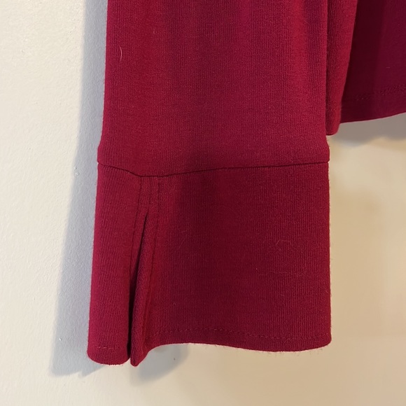 Pomegranate V neck button down long sleeve 90% rayon 4% spandex for elasticity. - Picture 3 of 6
